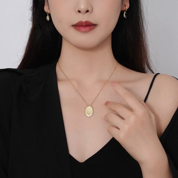 Gold-Plated Silver Oval Pendant Necklace on woman