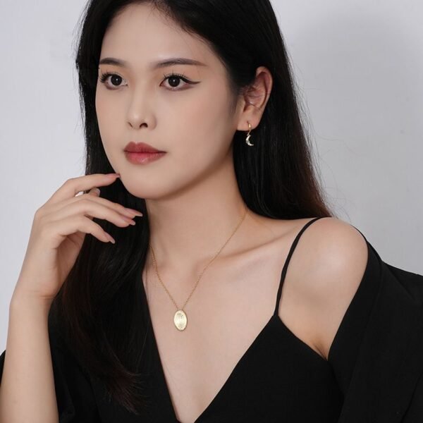 Gold-Plated Silver Oval Pendant Necklace on woman